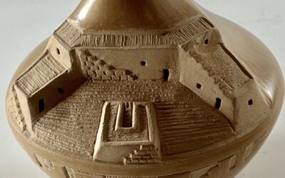 2025-09  Sculpted village pot